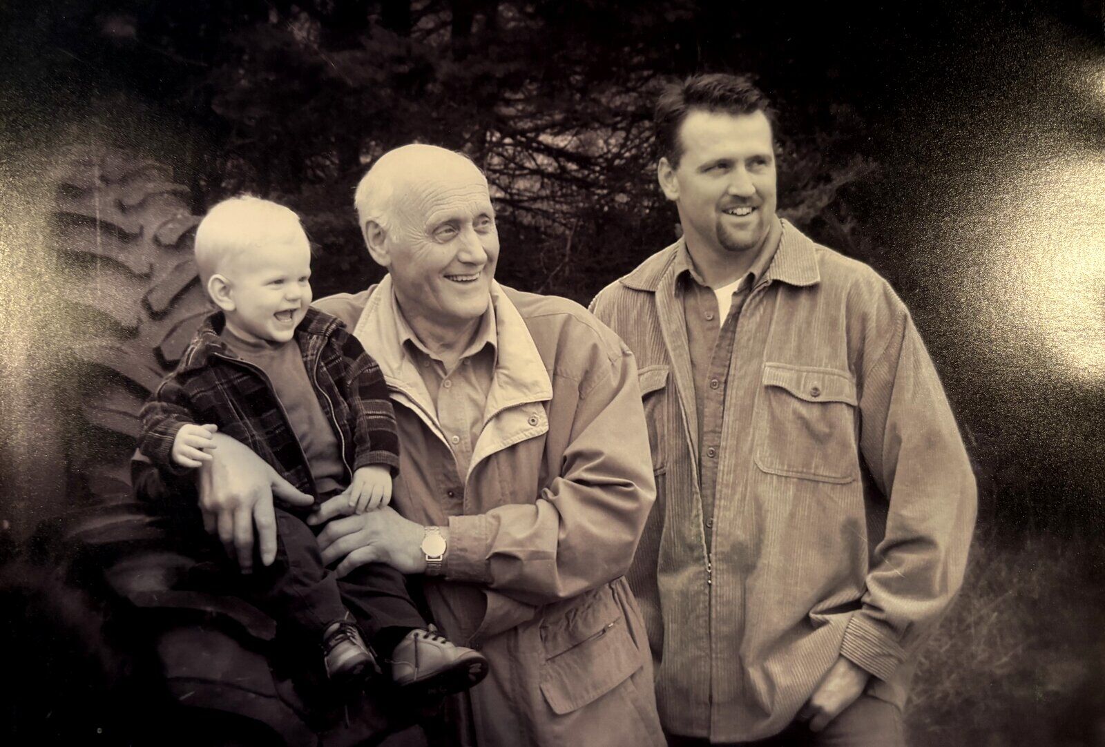 A sepia portrait of the Wilting family together, three generations